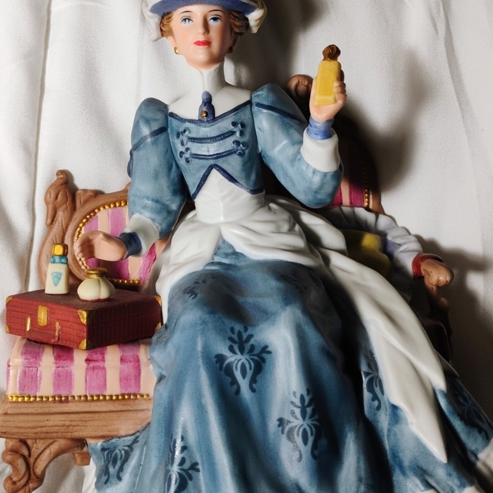 Avon Blue and White Victorian Lady Figurine